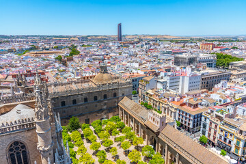 Naklejka premium Aerial view of Sevilla from la giralda tower with bullfighting arena and Torre Sevilla, Spain