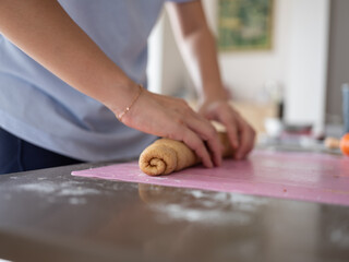 Obraz na płótnie Canvas Baking Cinnamon Roll at Home