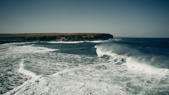 waves breaking on the beach