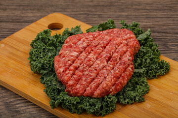 Raw beef burger cutlet for cooking