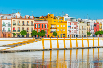 Fototapeta premium Triana neighborhood behind river Guadalquivir in Sevilla, Spain
