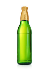 Beer bottle with gold foil top without label isolated on white background.