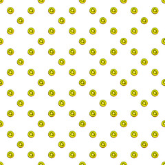 Seamless endless pattern of juicy green slices of kiwi fruit isolated on white background. Design for wrapping paper, fabric and wallpaper.