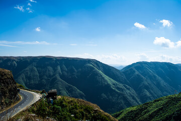 Fototapeta premium Curvy road on the mountains of Cherrapunjee. road from Shillong to Cherrapunjee in Meghalaya, north east India. 