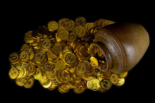 Gold Coin In Treasure Old Pot On Black Background