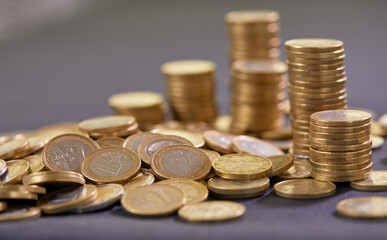 Stock Photo - Euro coins. Euro money. Euro currency.Coins stacked on each other in different positions. Money concept