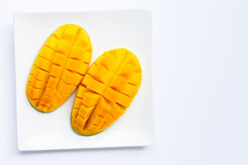 Tropical fruit, Mango on dish plate  on white background.