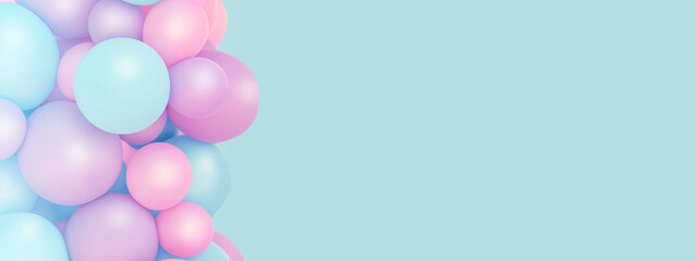 Fototapeta na wymiar Colorful balloons background, punchy pastel colored and soft focus. pink and mint balloons photo wall birthday decoration. Copy space. Web banner. Wedding party.