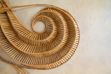 Art of decorating with bamboo on the brown polished wall background texture