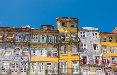 Obraz premium Oporto, Portugal. Houses of Ribeira Square located in the historical center of Porto along the river Duoro.