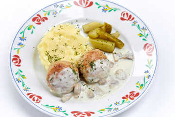meatballs with mashed potato and sauce