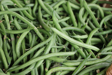 Close up of green beans on sale in a fruit and vegetable market