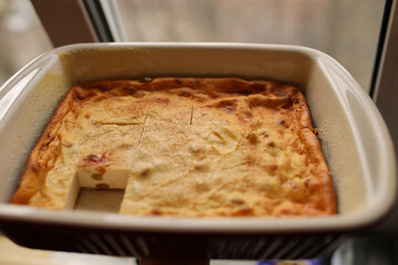 Cottage cheese casserole. Cottage cheese casserole in a ceramic shape.