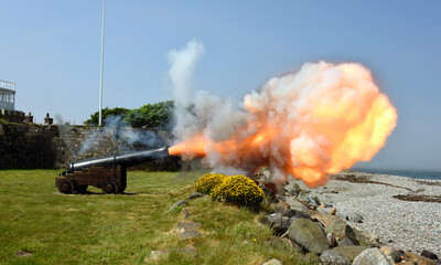 Historic Cannon firing at Fort Belan in Wales, UK..