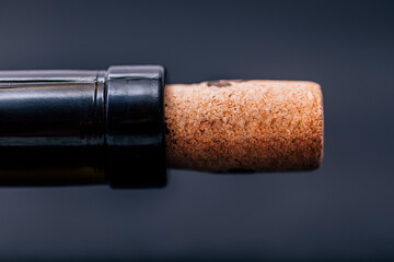 Cork in a bottle of wine close up with copy space for text. Template for greetings.