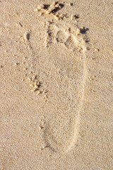 footprint in the sand at Copacabana beach.