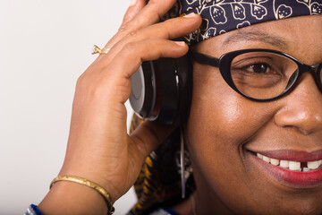 close-up of a mature woman with helmets, happy.