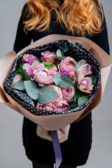 Bouquet of flowers in dusty pink package