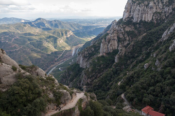 Fototapeta na wymiar Mountain view. Traveling through the mountains of Montserrat near Barcelona. The road to the monastery.