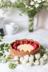 Classic New York Cheesecake with fresh berries on the plate - healthy organic dessert.