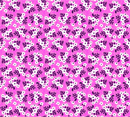 Seamless floral pattern for design. Small-scale white flowers and leaves. Pink background. Modern floral texture. A allover floral design in bright colors. The elegant the template for fashion prints.