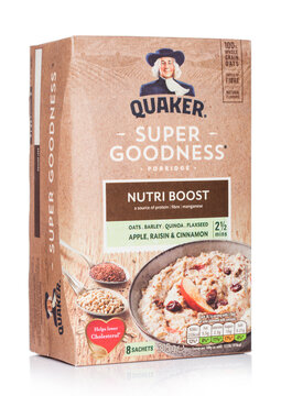 LONDON, UK - MARCH 05, 2019: Box of Quaker porridge Super Goodness Nutri Boost with apple and cinnamon on white background.