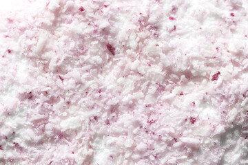 Macro close up of a candy coconut pink and white texture background. top View