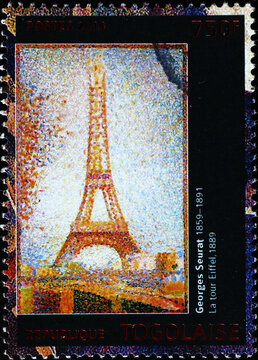 The Eiffel tower painted by Georges Seurat on postage stamp
