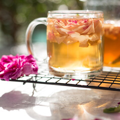Tea made from tea rose in a glass cup.