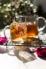 Tea made from tea rose in a glass cup.