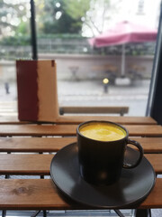 coffe cup on wooden table. Selective focus