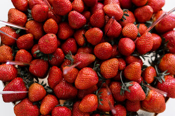 a plate red strawberries