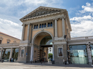 Obraz premium adua, entrance of new restorated Foro Boario parking at daytime with no cars in the street, near Prato della Valle square, with blue sky with some clouds