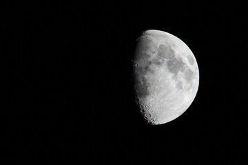 Half moon in the black sky