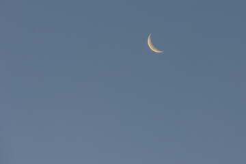 crescent moon with blue sky