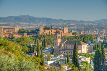 Fototapeta premium Sunset view of Alhambra palace and el Salvador church in Granada, Spain