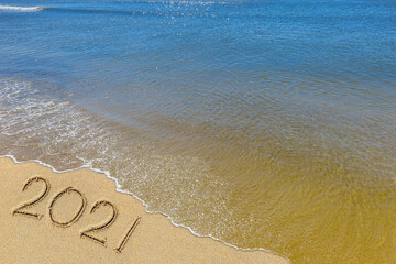 sea, sky, sand, inscription 2021,