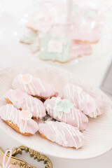 wedding sweets with pink and white frosting
