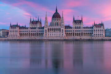 Fototapeta premium Hungarian Parliament, Budapest with reflection in Danube river during twilight