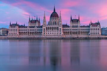 Hungarian Parliament, Budapest with reflection in Danube river during twilight