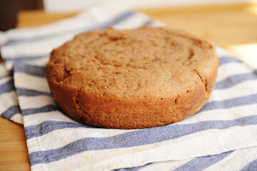 Freshly baked homemade whole grain bread. Round loaf