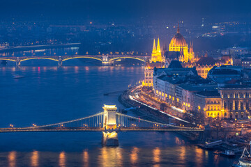 Aerial view of Hungarian Parliament Building and Szechenyi Chain Bridge, Budapest during twilight