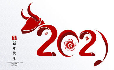 Chinese new year 2021 year of the ox , red paper cut ox character,flower and asian elements with craft style on background.(Chinese translation : Happy chinese new year 2021, year of ox)