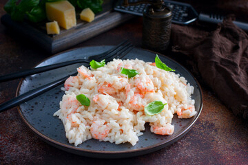 Shrimp risotto with cream sauce, selective focus