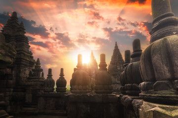 Rising sun shining at Prambanan temple lYogyakarta, Java, Indonesia