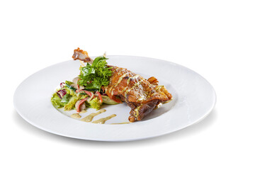 Crispy fried chicken served with salad, parsley, and mushroom mayonnaise sauce, isolated on white.