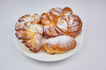 sweet bun on a plate with a white background
