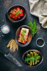 Mixed pickles platters of tomatoes, cucumber and Chinese cabbage served on the shabby surface