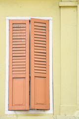 wooden window with shutters