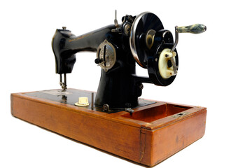 Old, retro vintage sewing machine on a white background.